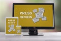 Press review concept on different devices