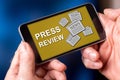 Press review concept on a smartphone