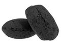 Pressed charcoal or coconut barbecue coal isolated on white background. Bbq briquettes Royalty Free Stock Photo