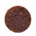 Pressed coffee grounds isolated against white background Royalty Free Stock Photo
