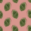 Pressed green leaves pattern on beige background