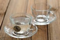 Pressed green puerh tea brewed in glass teacup