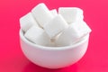 Pressed sugar cubes in a ceramic Cup Royalty Free Stock Photo