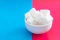 Pressed sugar cubes in a ceramic Cup Royalty Free Stock Photo