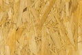 Pressed wood background texture, brown wood particle board, chipboard Royalty Free Stock Photo