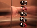 Pressing Elevator Button