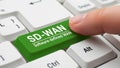 Pressing sd-wan key on keyboard Royalty Free Stock Photo