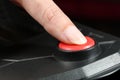 Pressing STOP or START button. Finger presses the red button. Royalty Free Stock Photo