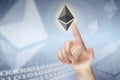 Pressing virtual etherium sign Royalty Free Stock Photo
