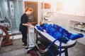 Pressotherapy machine on woman in beauty center