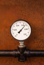 Pressure adjustment close-up on a background of rusty iron engineering Royalty Free Stock Photo