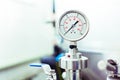 Pressure gauge on beer tank brewing equipment. Close-up, macro Royalty Free Stock Photo