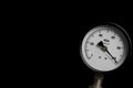 Pressure gauge on black background