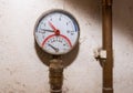 Pressure gauge, manometer on copper pipe close up shot, Royalty Free Stock Photo