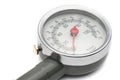 Pressure gauge for measuring air pressure in car tires on a white background Royalty Free Stock Photo