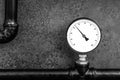 Pressure gauge measuring device on a gas factory background close-up in gray tones Royalty Free Stock Photo