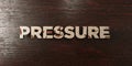 Pressure - grungy wooden headline on Maple - 3D rendered royalty free stock image