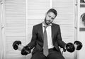 Pressure tension stress. Mental and emotional tension. Man raise heavy dumbbells. Businessman manager exhausted. Sport