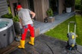 Pressure Washing Concrete Bricks Patio Using Washer Surface Attachment Royalty Free Stock Photo