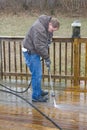 Pressure washing deck Royalty Free Stock Photo