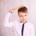 Preteen boy with coms. Child cute portrait. independent kid hygiene Royalty Free Stock Photo