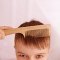 Preteen boy with coms. Child cute portrait. independent kid hygiene Royalty Free Stock Photo