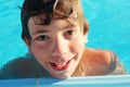 Preteen boy in swimming pool close up photo Royalty Free Stock Photo