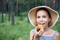 Preteen girl with apricot