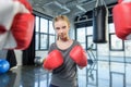 Preteen girl boxing with senior trainer Royalty Free Stock Photo