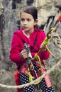 Preteen girl with climbing equipment. Adventure. Sport activity.