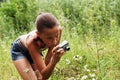 Preteen girl with digital camera Royalty Free Stock Photo