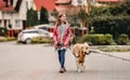 Girl and golden retriever dog Royalty Free Stock Photo