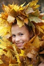 Preteen girl in leaf garland