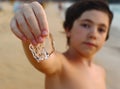 Preteen handsome boy with jellyfish Royalty Free Stock Photo