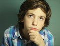 Preteen handsome boy think over difficult issue