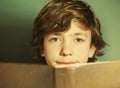 Preteen hansome boy reading book