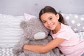 Pretend friend. Happy kid cuddle teddy bear. Little girl smile with toy friend. Friend and friendship. Adoption and Royalty Free Stock Photo