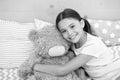 Pretend friend. Happy kid cuddle teddy bear. Little girl smile with toy friend. Friend and friendship. Adoption and Royalty Free Stock Photo