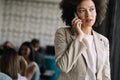 Pretty african american business woman talking on her mobile phone Royalty Free Stock Photo