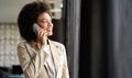 Pretty african american business woman talking on her mobile phone Royalty Free Stock Photo