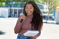 Pretty african american female journalist of radio station or television live on air Royalty Free Stock Photo