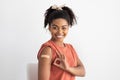 Pretty african american lady patient showing okay gesture, got vaccinated Royalty Free Stock Photo