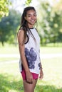 Pretty African American Teenage Girl Posing Outside in Park Royalty Free Stock Photo