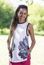 Pretty African American Teenage Girl Posing Outside in Park Area Royalty Free Stock Photo