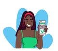 Pretty African American woman demonstrates her mobile phone with QR code. Concept of health passport, vaccination