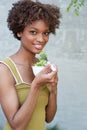 Pretty African American woman with salad