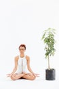 Pretty african american young woman meditating and practicing yoga Royalty Free Stock Photo