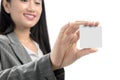 Pretty asian business woman showing blank business card on her hand standing Royalty Free Stock Photo