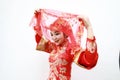 Pretty Asian Chinese beautiful Bride with Traditional chinese wedding red dress and red head covers