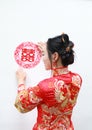 Pretty Asian Chinese beautiful Bride with Traditional chinese wedding red dress and two double happiness